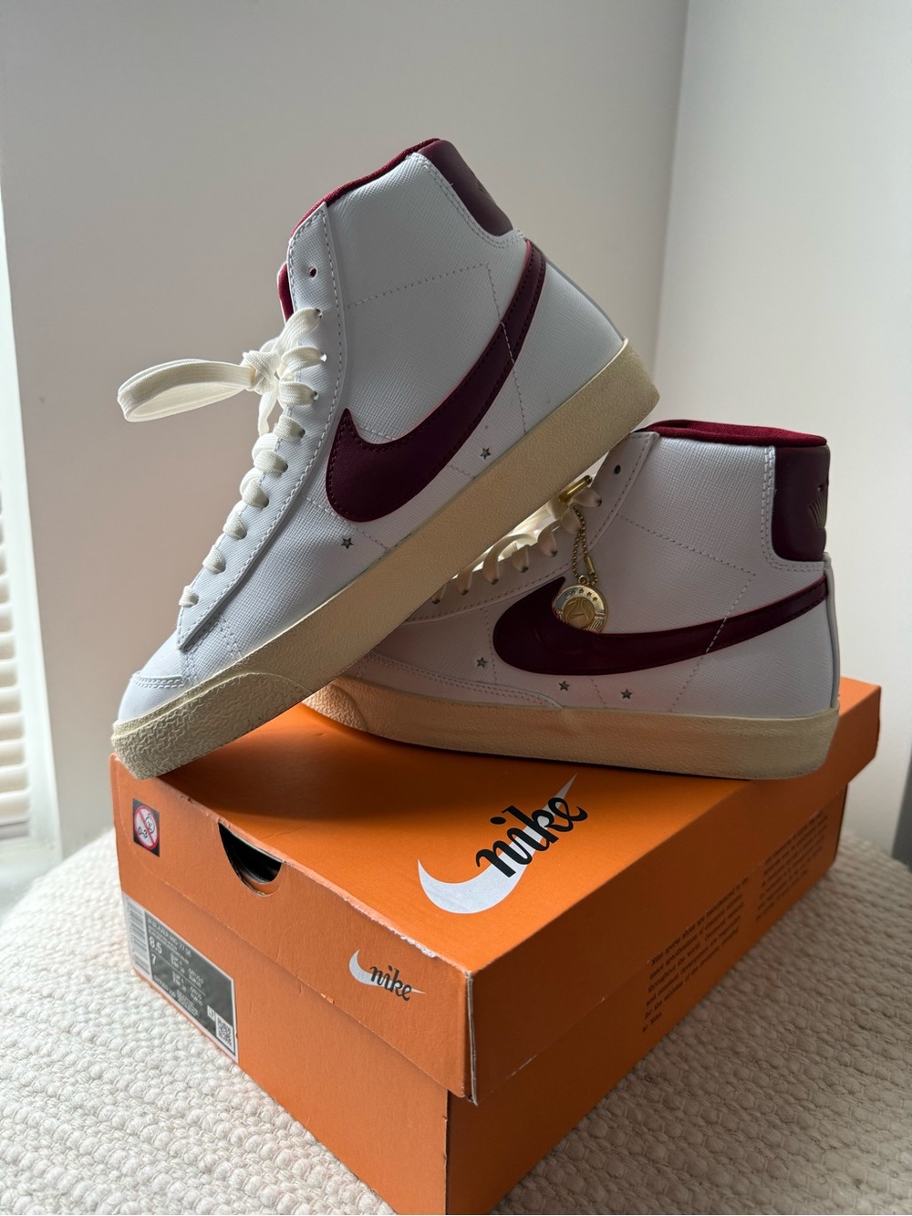 Nike Women’s White and Burgundy High-Top Sneakers with Star Accents